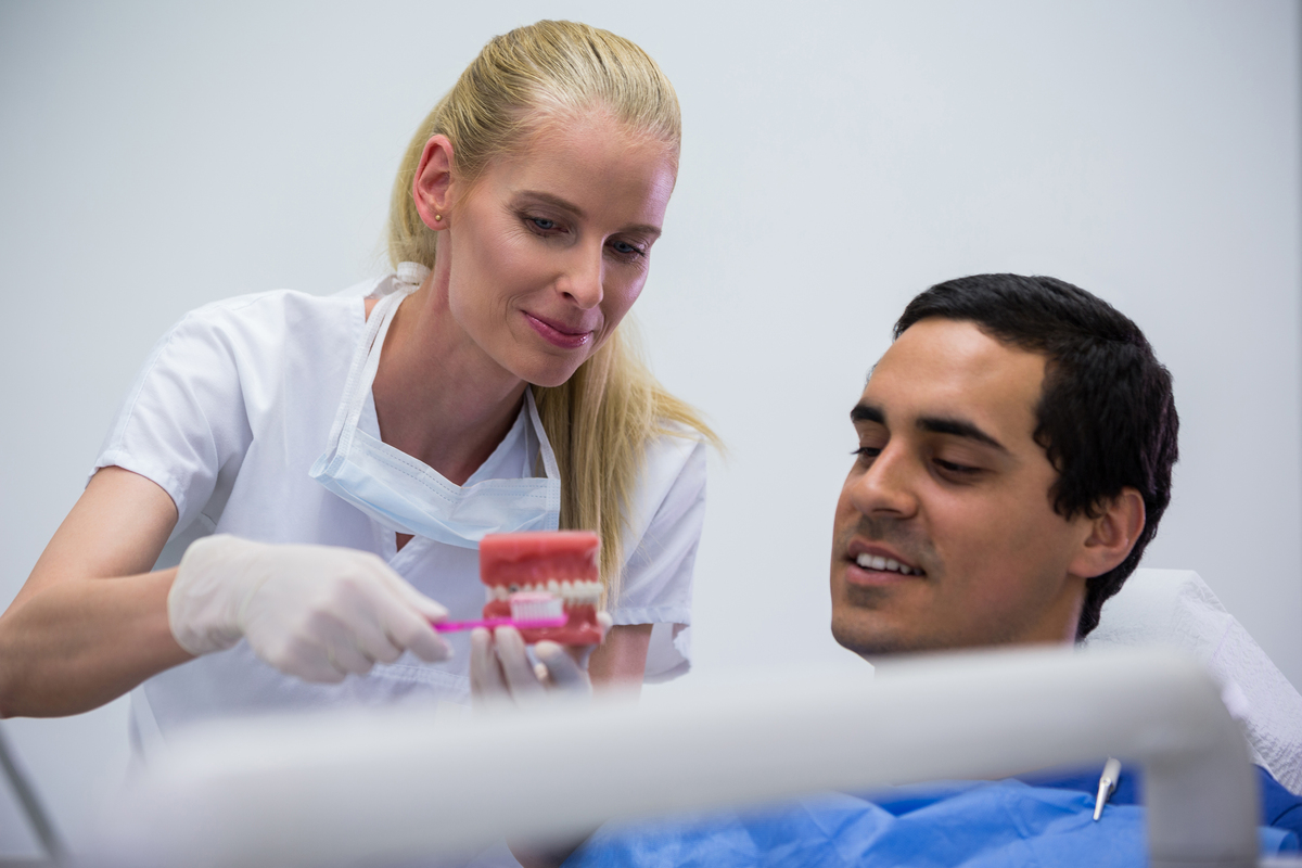 dental implants vs dentures which lasts longer and costs less over time
